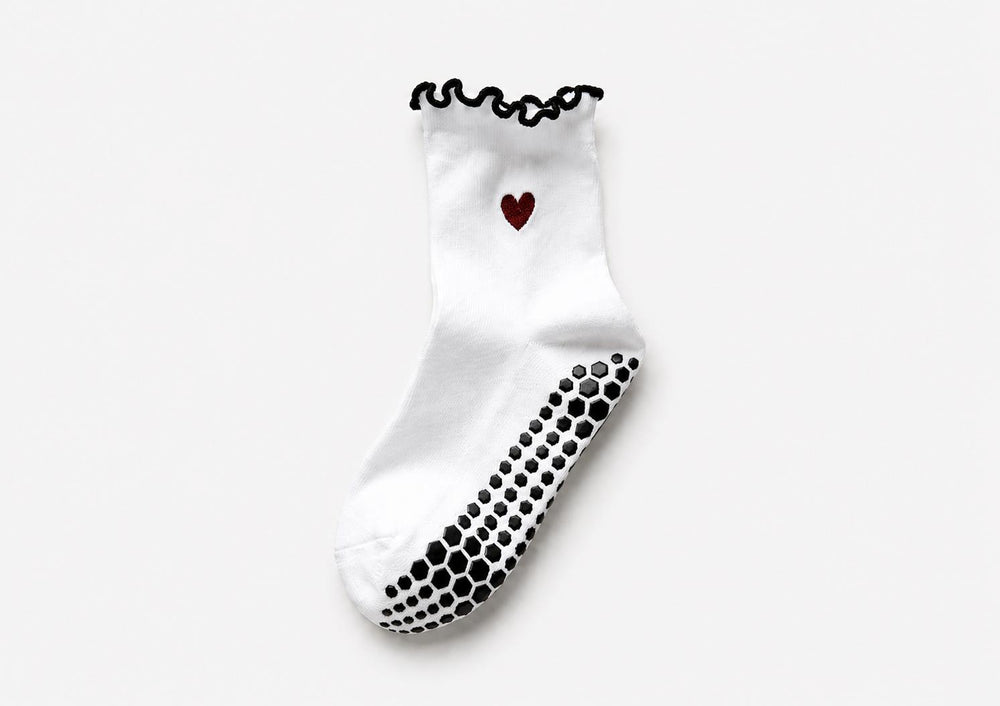 Grip socks with silicone dots on the bottom