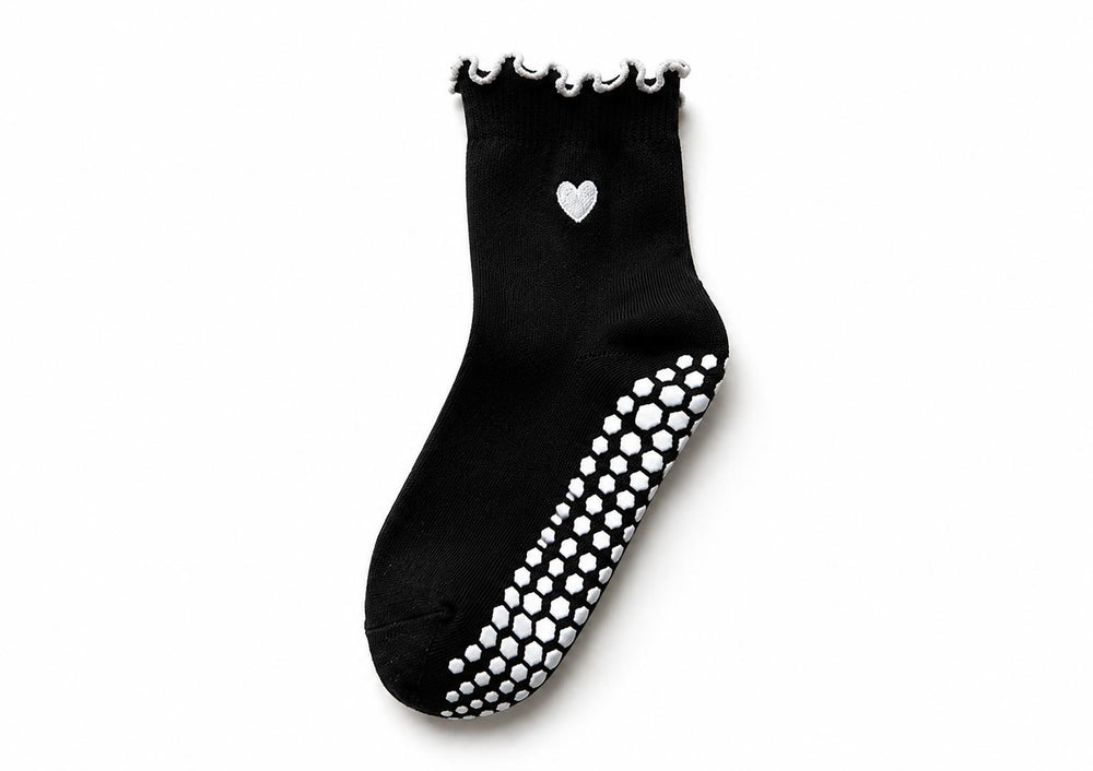 Heart grip socks worn during Pilates