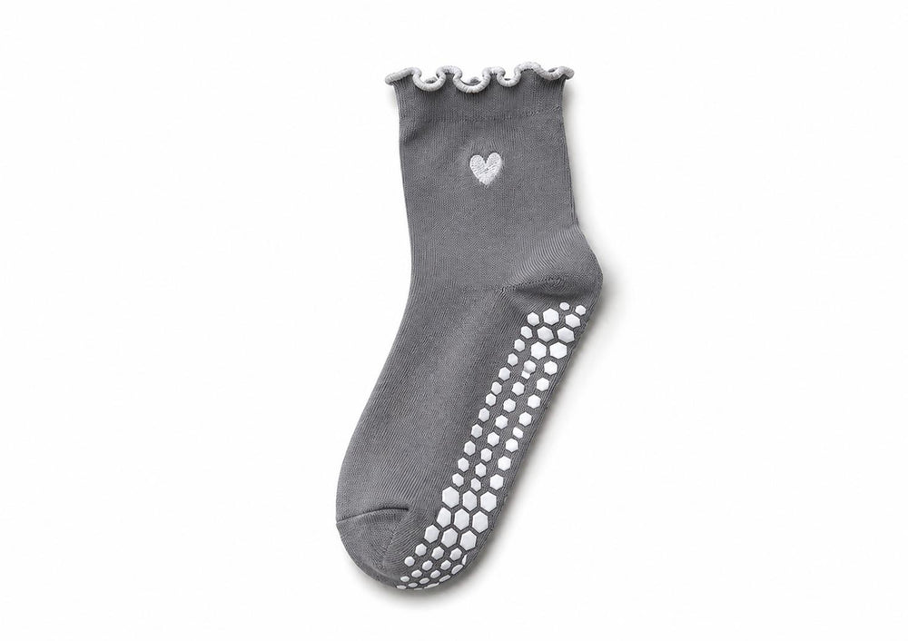 Grip socks with silicone dots on the bottom