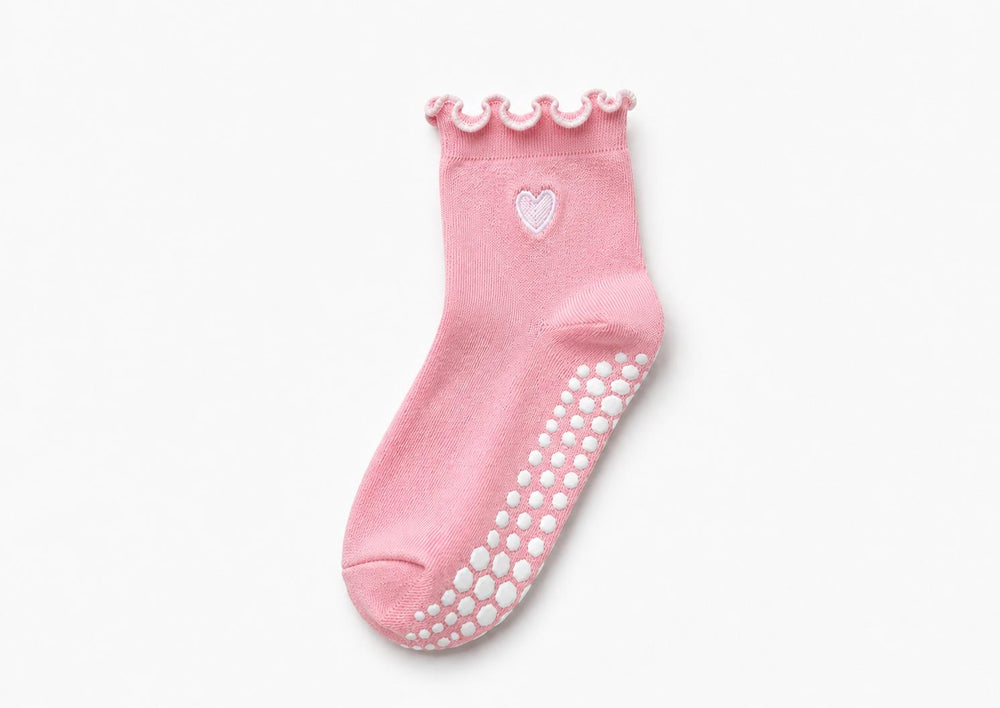 Grip socks with silicone dots on the bottom