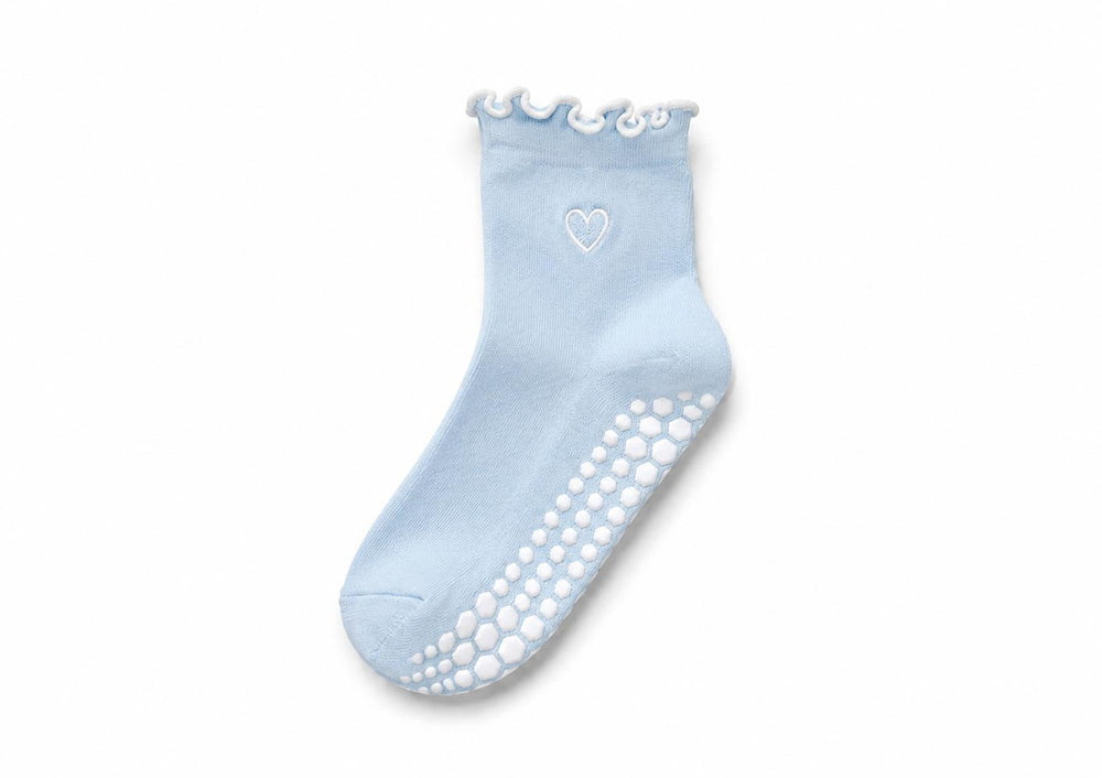 Heart grip socks worn during Pilates